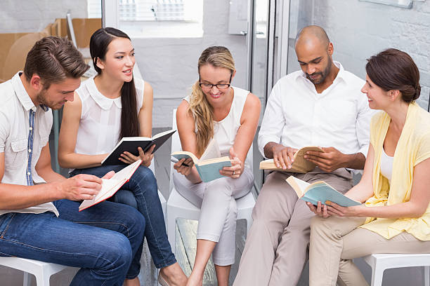 istock Business team talking about their books 516683119