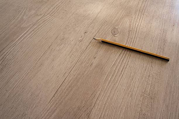 グラ��ファイトのペン - wood laminate flooring ストックフォトと画像