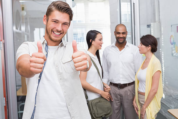 istock Man giving thumbs up at camera 516684893