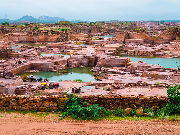 istock Open-pit red sandstone mine, Jodhpur, India 516685115