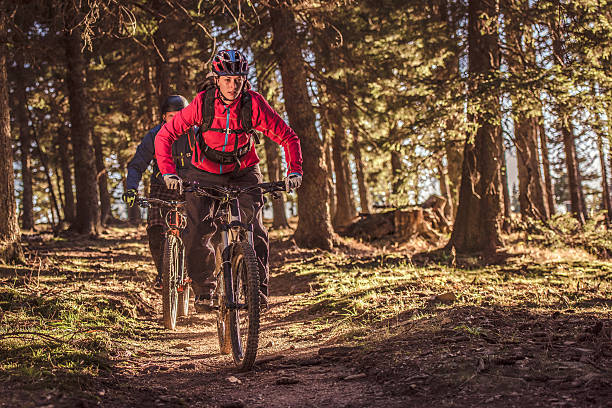 istock People enjoying mountain biking 516685192