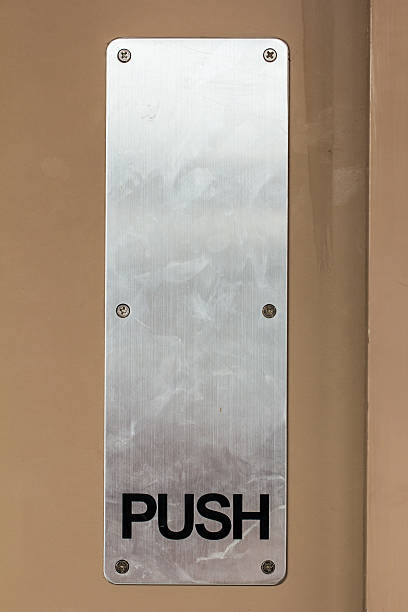 istock push sign on the door 516685582