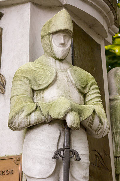 istock Statue of knights in white stone, Aviles, Spain 516686614
