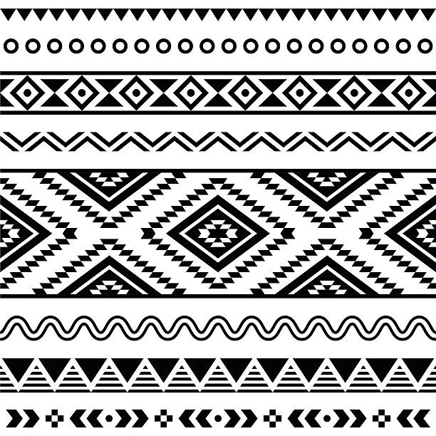aztec etniczne bezszwowe biały wzór na czarne tło - indigenous culture obrazy stock illustrations