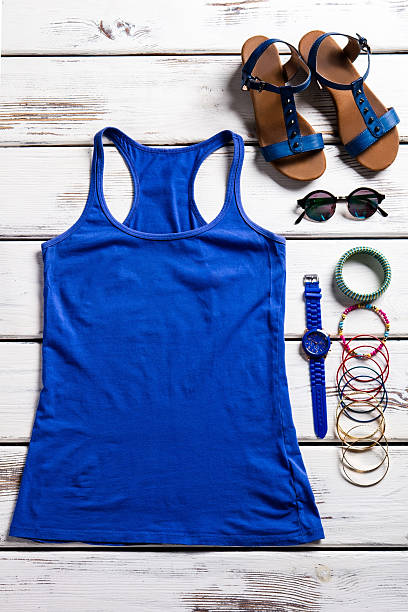 istock Woman's top and summer footwear. 516687894