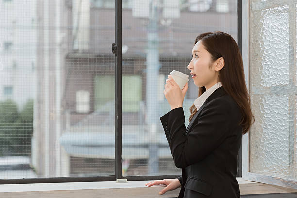 istock Business woman drinking coffee 516689140