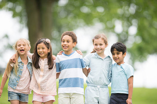 istock Friends Standing Together in a Row 516689248