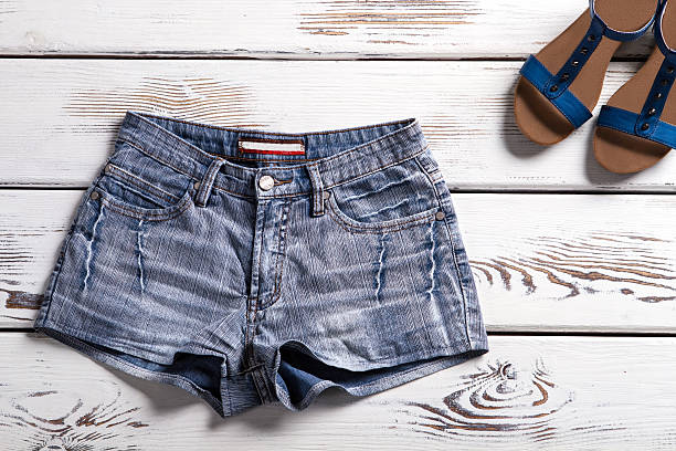 istock Shorts and footwear on shelf. 516689266