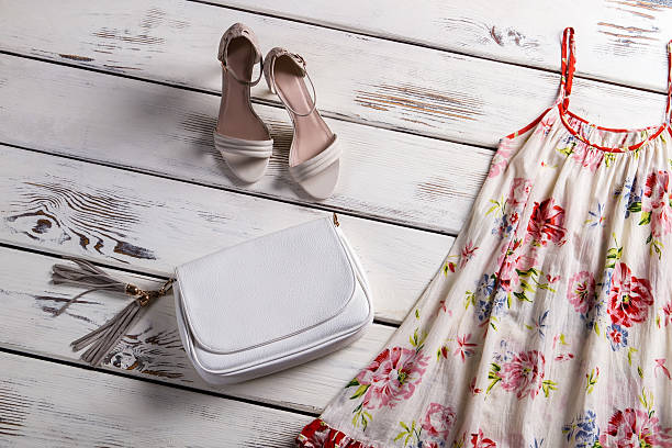 istock Clutch purse and light sarafan. 516690722