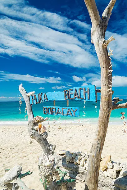 Photo of puka beach sign on paradise boracay island philippines