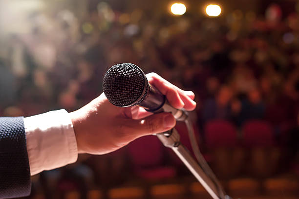 Microphone with crowd stock photo