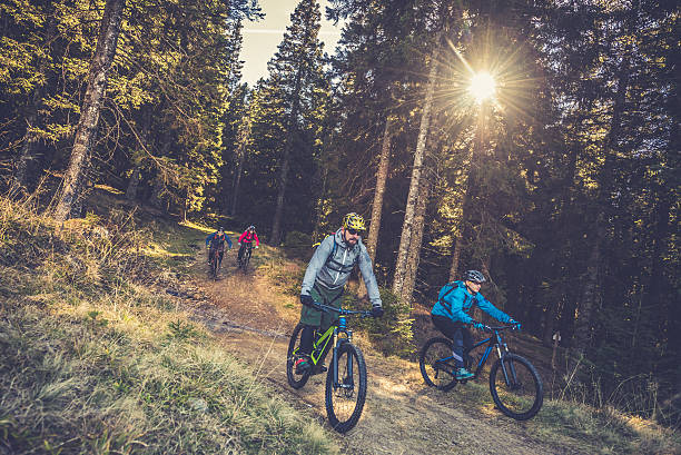 istock People enjoying mountain biking 516692364