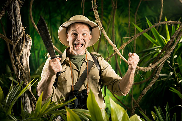 istock Cheering survival explorer in the jungle 516693852
