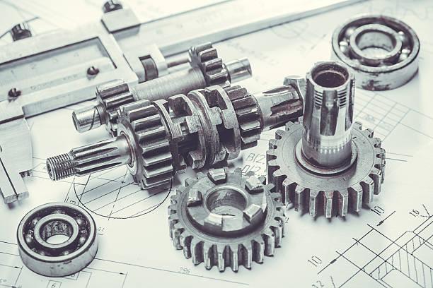 istock metal gears on engineering drawings 516695058