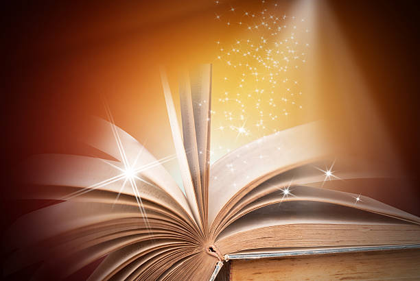 istock Abstract magic book on wooden background 516716750