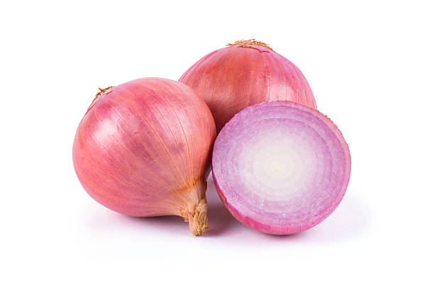 istock Ripe onion isolated on white background 516716816