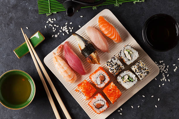 istock Set of sushi, maki and green tea 516719934