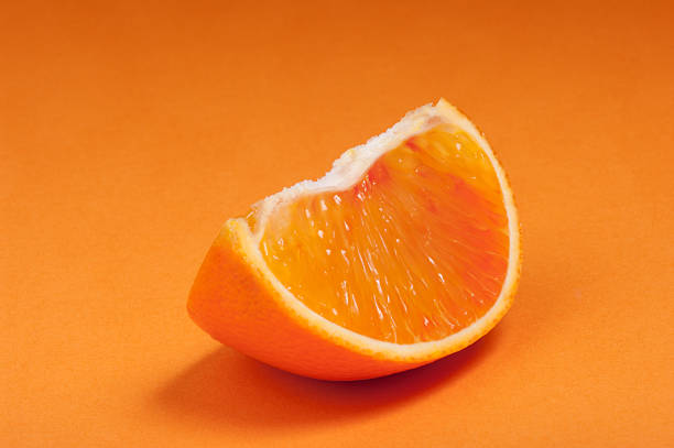 istock Part of blood red sicily orange. Studio shoot. 516721612