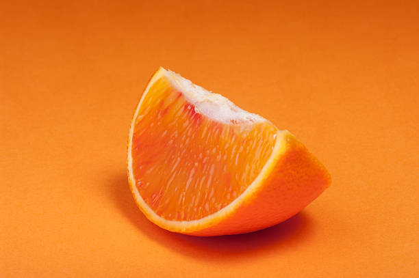 istock Part of blood red sicily orange. Studio shoot. 516721766
