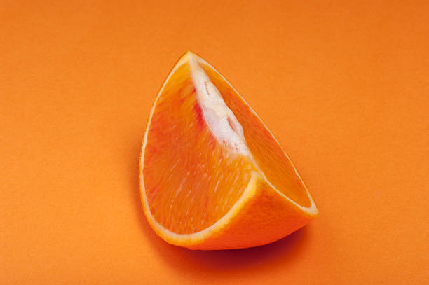 istock Part of blood red sicily orange. Studio shoot. 516721930