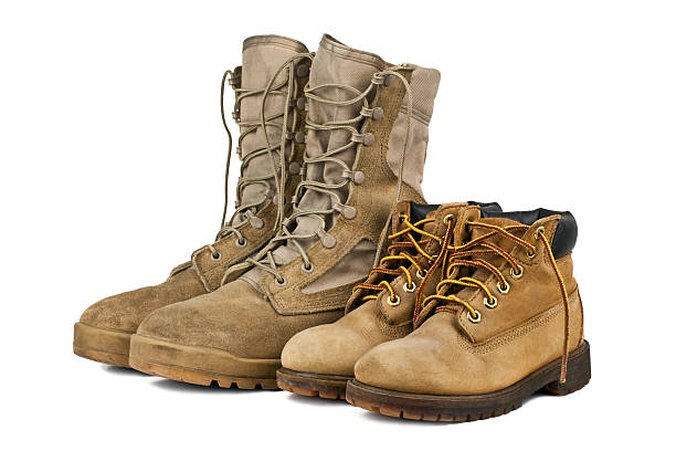 istock Children  hiking and adults army boots 516723516
