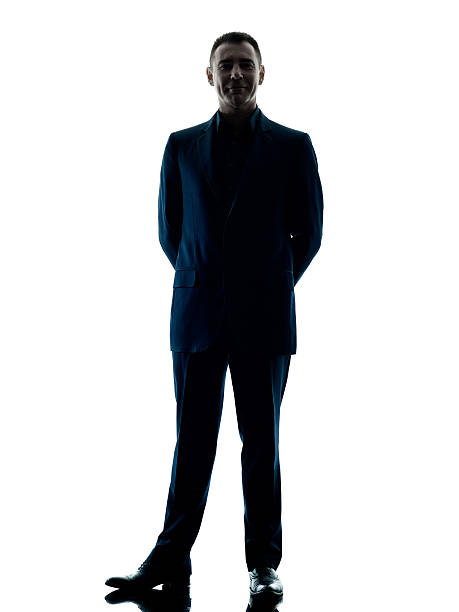 istock business man standing silhouette isolated 516725114