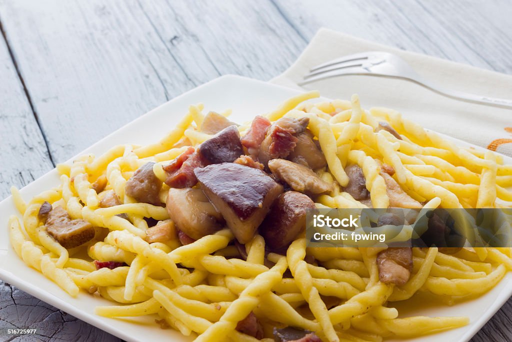 Trofie pasta with mushrooms from Italy Cheese Stock Photo