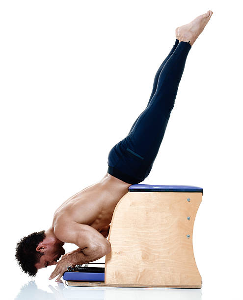 istock man fitness pilates exercices isolated 516727062