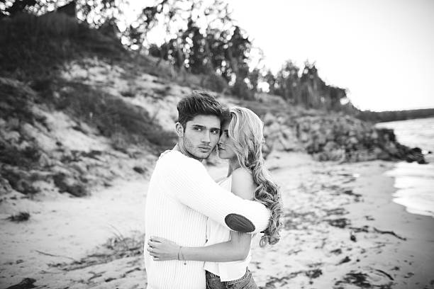 istock happy couple  at the beach 516727765