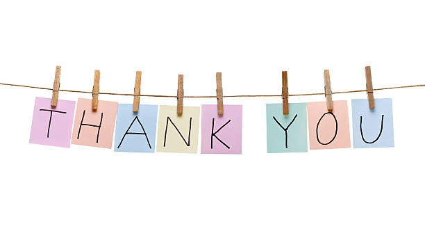 istock clothes peg and note paper on clothes line rope 516727766