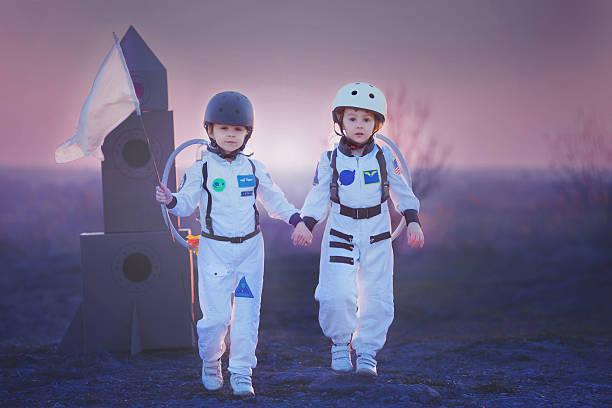 istock Two adorable children, playing in park on sunset 516727982