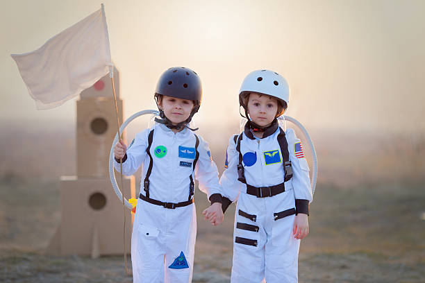 istock Two adorable children, playing in park on sunset 516728058