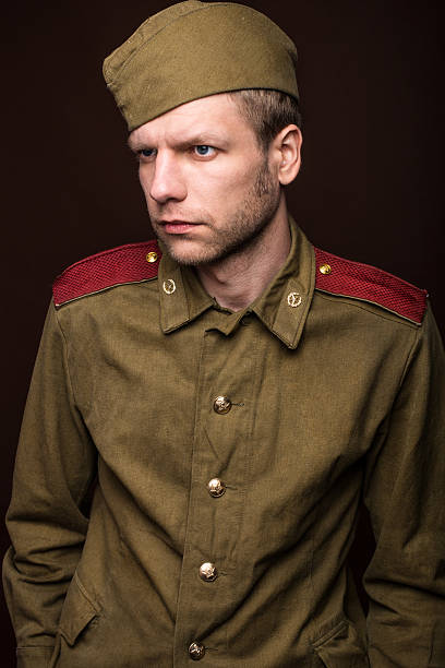 istock Russian soldier looks at something 516728675