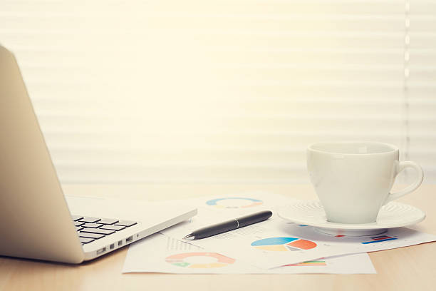 istock Office desk workplace with laptop and coffee 516728738