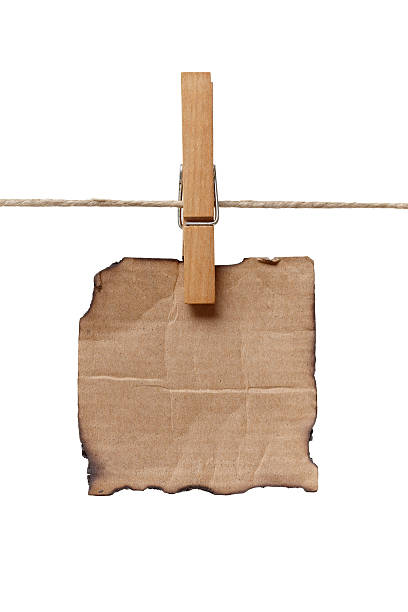 istock clothes peg and note paper on clothes line rope 516729206