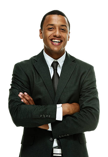 istock Cheerful businessman standing with arms crossed 516730013
