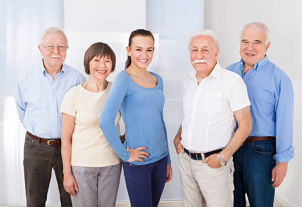 istock Confident Caregiver With Senior People 516730925