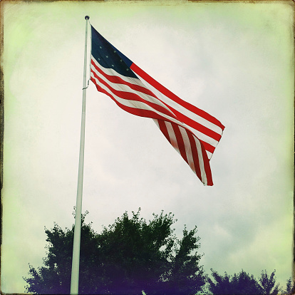 An old 13 star American flag.   Photographed with an iPhone.