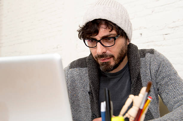 istock corporate portrait  young hispanic hipster businessman working at office 516755836