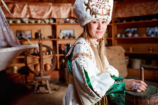 Young woman in traditional yurt dwelling stock photo