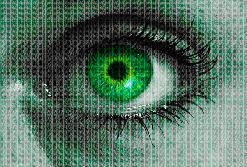 futuristic eye with matrix texture looking at viewer concept.