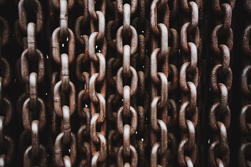 Close-up of rusty chains on a shipyard. With copy space. Shot with a 35-mm full-frame 61MP Sony A7R IV.