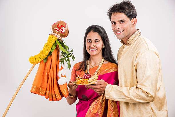 istock smart indian couple performing gudhi padwa puja 516767122