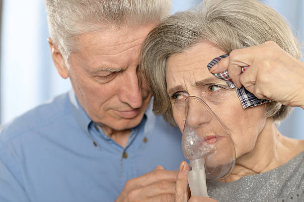 istock Elderly couple with inhaler 516767994
