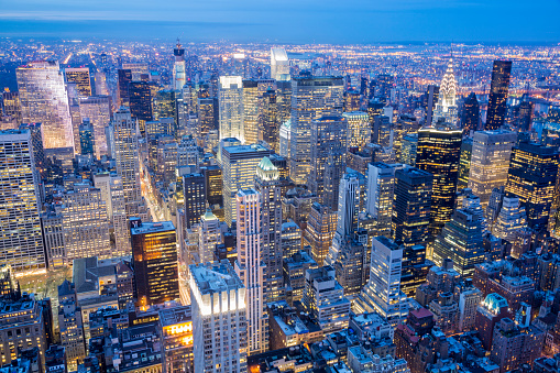 Midtown Manhattan skyline, New York City, illuminated buildings at night, elevated view, horizontal, long exposure with tripod, USA