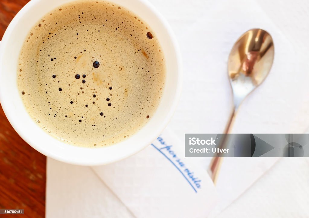 Cup of delicious coffee Cup of coffee with napkin and spoon Black Color Stock Photo