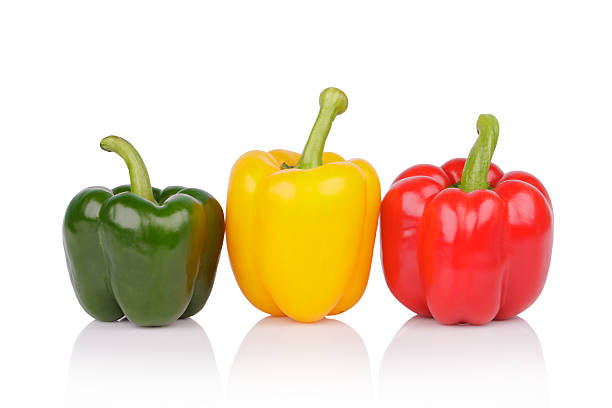 istock bell peppers or capsicum isolated on white background 516780857