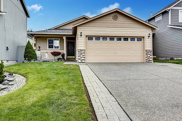 istock Gararge with stone trim and new driveway 516782849