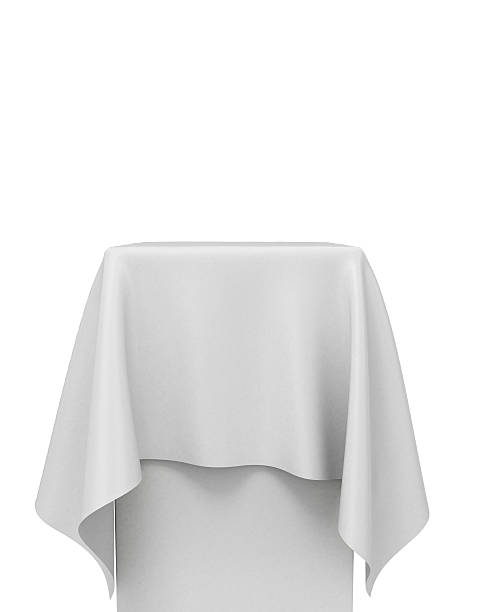 istock white cloth on a square pedestal isolated on white 516793758