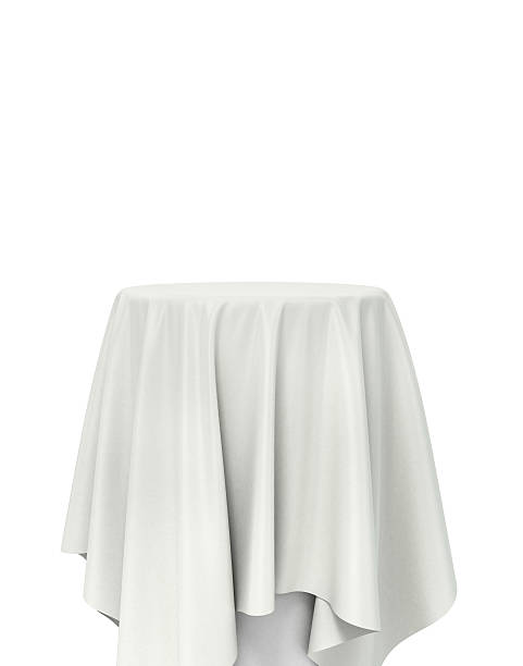 istock white cloth on a round pedestal, isolated on white 516794156